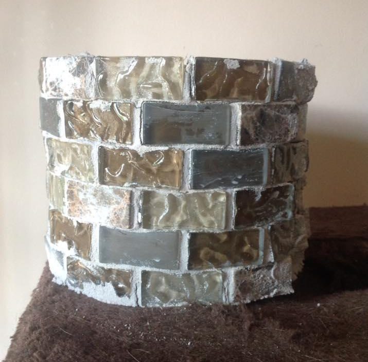 On the altar I have placed a wishing well. On the paper, write a wish you have for the community and place it in the well...